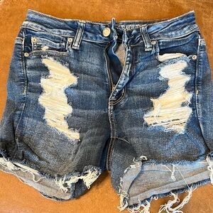 Distressed jean shorts